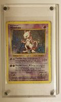 Front view of Mewtwo Holo Rare Pokémon card from Base Set Shadowless encased in clear protective case.