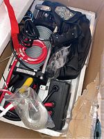 Winch, power cables, remote control, steel hook, mounting hardware in foam-lined box