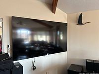 Wall-mounted 85-inch Samsung TV in living room