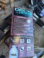 Photo showing top and side view of Deck & Home sprayer box with close up on label and features.