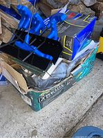 Box with mixed tools and winch packaging.