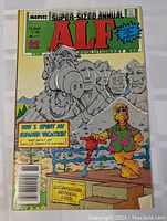 Front cover showing ALF comic book titled 'Super-Sized Annual' featuring ALF in front of Mount Rushmore illustration.