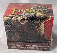 Front and side of the unopened Frenzy card game box showing fantasy creature artwork and text.