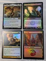 Four Magic the Gathering cards arranged in a 2x2 grid. Top left is Sephara, Sky's Blade; top right Moriok Reaver; bottom left Ancestral Chimera; bottom right Basic Mountain land card, all holographic foil finish.