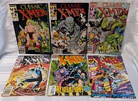 Front view of 6 Marvel X-Men comic books arranged in two rows of three, showing colorful covers with classic X-Men characters and titles.