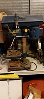 Front side view of Mastercraft drill press including worktable and base, showing overall condition and setup.