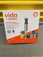 Box of Vida by Paderno variable-speed immersion blender showing branding, features, and warranty info.