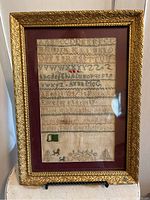 Front view of sampler and gilt frame
