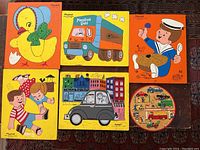 Overview of 6 vintage Playskool puzzles with various cartoon illustrations including chick, truck, sailor, children playing, family in car, and round wooden vehicle puzzle.