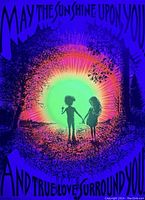 Photo of the vintage 1970s blacklight poster 'May The Sun Shine Upon You' depicting two children holding hands in front of a radiant sun with floral elements and the text.
