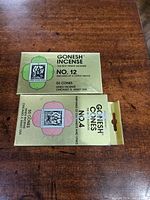 Top view of two vintage boxes of Gonesh incense cones, No. 12 Citrus Grove and No. 4 Orchards and Vines, showing front labeling and cone counts