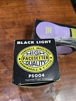 Front of Yorkville Industries black light bulb box showing brand, model PS004, and origin from Korea.