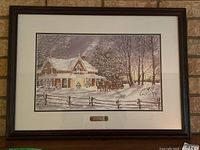 Full view of the framed and matted print showing the winter scene with a horse-drawn sleigh beside a Victorian house.
