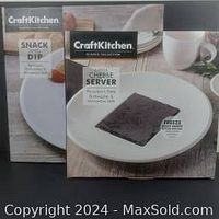 Photo of the Cheese Server package showing the porcelain plate with a slate insert plate in the center for cheese serving.