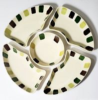 Top-down view of the 5-piece snack set including four triangular snack bowls arranged around a central round dip bowl with multi-colored rectangular blocks on cream ceramic.