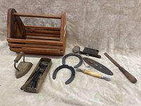 Similar side angle of lot with tool carrier and tools spread out to show details and condition