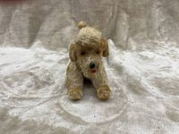 Front view of Steiff terrier dog plush, showing facial features, fur texture and condition.