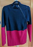 Black and pink color-block sweater with asymmetrical zipper, Lauren Ralph Lauren label visible.