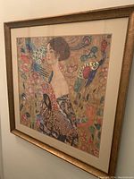 Full view of framed print hung on wall