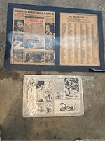 Framed newspaper and memorial list dedicated to Dr. Martin Luther King Jr. alongside an illustrated sheet featuring black and white sketches.