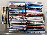 Photo showing all DVDs spread out or stacked with visible titles
