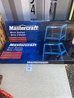 Two boxed Mastercraft Work Station supports stacked, showing full packaging and branding.