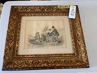 Full framed artwork showing the signed colored pencil drawing of three figures by a boat.