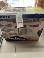 Full view of White Model 2335 Sew Easy sewing machine original retail box with branding and model number visible.