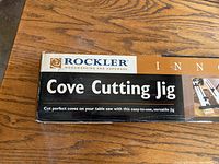 Photo of the Rockler Cove Cutting Jig box top showing brand and product name.