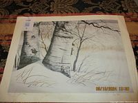 Full view of the limited edition print showing a winter scene with birch trees and snow, with visible matting edges.