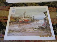 Photo showing one print from the set depicting a dry dock maritime scene with boats and water, signed by Collin.