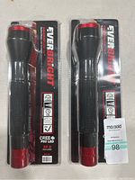 Two new EverBright tactical LED flashlights in original packaging, showing front view with branding and specifications visible.