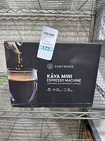 Box front showing the Chef Wave Káva Mini Espresso machine with coffee being poured into a cup, listing 20 bar pressure and compatibility with Nespresso capsules.