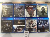 All eight PS4 game cases arranged in two rows showing front cover art for each game.