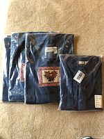 Blue denim L.L. Bean shirt and three Access denim jumpers, all new and in packaging