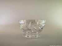 Front side of the clear Waterford glass bowl showing intricate cut designs and the pedestal base.