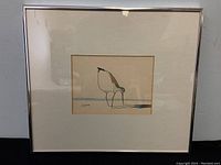 Framed watercolour artwork showing full piece with matting and frame