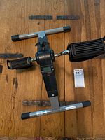 Full view of the compact drive exercise machine showing pedals and frame