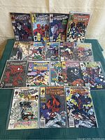 Full lot of 17 comics laid out on table