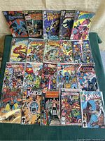 Top two rows laid out flat on green cloth