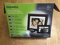 Box of Insignia 8 inch digital picture frame with image and specs