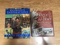 Photo showing front covers of two knitting and fiber craft books, one by Kaffe Fassett titled 'Glorious Inspirations', and the other 'The Fleece & Fiber Sourcebook'