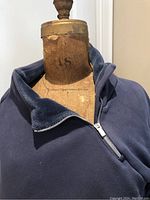 Front close-up of zipper and velour lining showing fabric texture and zipper detail