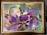 Full view of mixed media painting in gold-tone wooden frame on a dark background