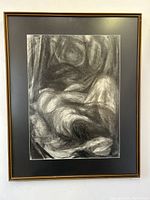 Full view of the framed charcoal etching showing the recumbent torso artwork, gold-tone frame, and black mat.