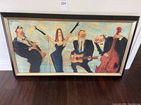 Full front image of the painting showing a jazz band with four musicians and a female singer, framed with a black and gold frame.