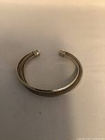 Front view of vintage Tiffany & Co sterling silver mesh cuff bracelet showing flexible mesh design and open end caps.