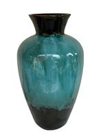 Front view of the large Blue Mountain Pottery vase showing teal and green drip glaze over black base.