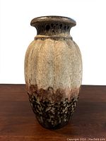 Front view of large Scheurich floor vase showing the beige to brown glaze with textured surface and bulbous shape.