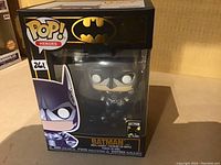 Photo of a sealed Batman Funko Pop! Heroes vinyl figure in box number 261